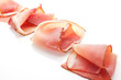 Prosciutto slices arranged.
