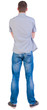 Back view of young men in  shirt and jeans.