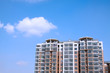 high rise building in the blue sky
