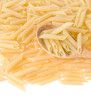 raw pasta and spoon isolated on white raw pasta and spoon isolated on white