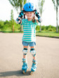 Photo: Little girl in roller skates Little girl in roller skates