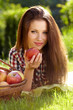 Beautifuwoman  in the garden with apples