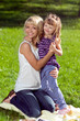 Mother hugging her daughter