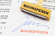 Holzstempel auf Dokument: Mahnspesen
