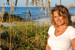 Attractive Woman on the Beach at Sunrise Attractive Woman on the Beach at Sunrise