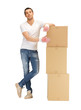 handsome man with big boxes
