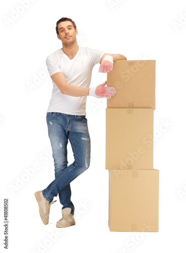 Foto: handsome man with big boxes handsome man with big boxes