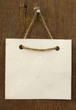 blank paper note hanging