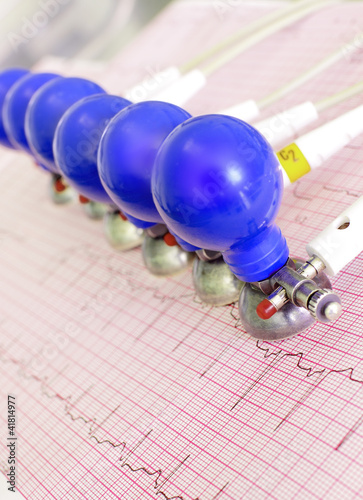 Photo: ECG electrodes with suction cups on the background of the electr ECG electrodes with suction cups on the background of the electr
