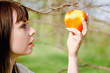 Portrait of beautiful young girl picking the apple Portrait of beautiful young girl picking the apple