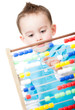 Boy playing with an abacus