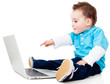 Boy pointing at a laptop