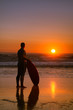A surfer watching the waves A surfer watching the waves
