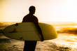 A surfer watching the waves A surfer watching the waves