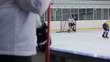 View of the hockey game with the bench