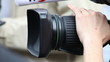 Cameraman with camera (close up)