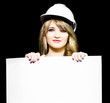 Female architect holding blank blueprint design