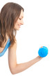 Young woman exercising with dumbbell, isolated Young woman exercising with dumbbell, isolated
