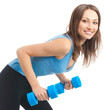 Young woman exercising with dumbbells, isolated