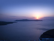 Sunset over the new Volcano at Santorini Greece