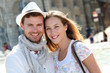 Smiling couple visiting French city in summertime