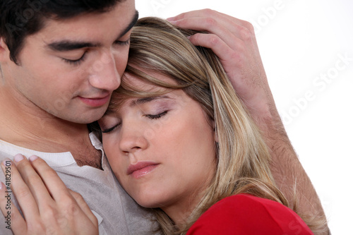 Photo: Man comforting his girlfriend Man comforting his girlfriend