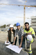 A team of construction workers working together