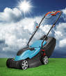 Lawnmower against blue sky and cumulus