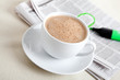 Morning coffee with newspaper