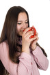 Portrait of a beautiful girl with a cup of coffee in hand