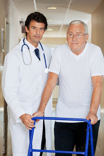 Photo: Doctor Helping An Old Man With His Walker Doctor Helping An Old Man With His Walker