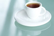 cup of tea on a glass surface