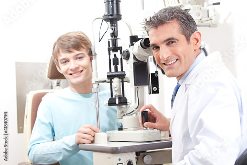 Photo: Optometrist And Pateint In Clinic Optometrist And Pateint In Clinic