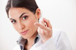 Female Optometrist With Contact Lens