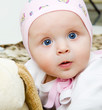 baby with a soft toy