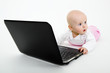 Baby girl with a laptop