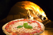 Photo: Pizza Margherita in a pizza oven Pizza Margherita in a pizza oven