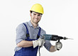 Bauarbeiter mit Bohrmaschine