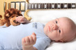Foto: Baby boy laying with guitar Baby boy laying with guitar