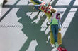 Students laying on row of school desks studying