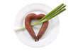 Wurst in Herzform mit Zwiebel Pfeil