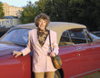 mature woman near car