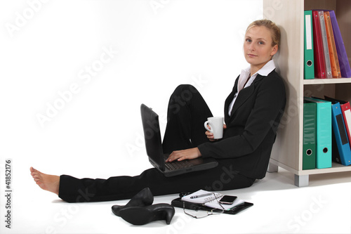 Photo: Business professional taking it easy Business professional taking it easy