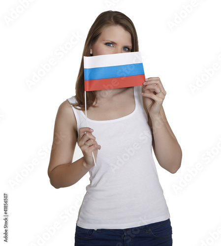 Photo: Attractive woman hides her face behind flag of Russia Attractive woman hides her face behind flag of Russia