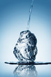 Water pouring on ice. Water pouring on ice.