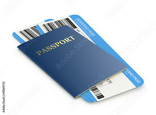 Photo: Passport and airline boarding pass tickets Passport and airline boarding pass tickets