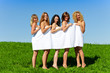 Foto: Women with towel on meadow Women with towel on meadow