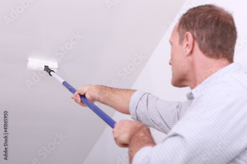 Photo: craftsman painter working craftsman painter working