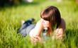 pensive girl on grass