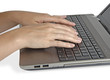 Woman typing on notebook